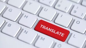 Keyboard with Translate button in Red in English Language