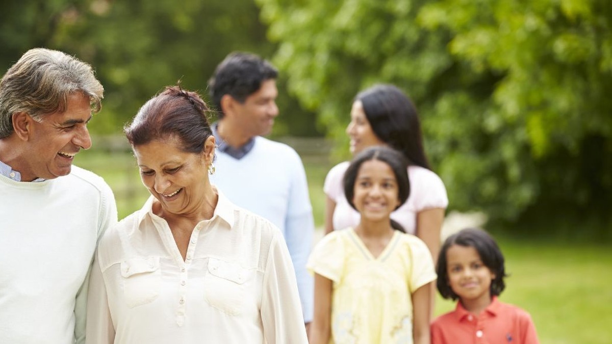 sell-inherited-property-with-indian-power-of-attorney-hero A family together outdoors, illustrating selling inherited Indian property with a power of attorney